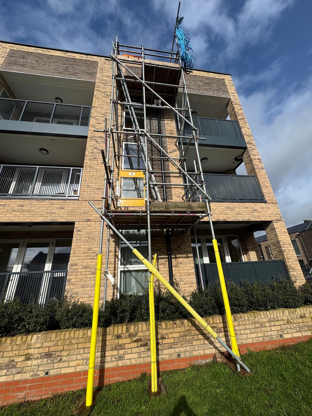 Scaffolding set up outside a multi-storey residential building