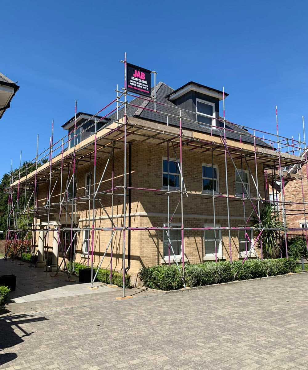 Scaffolding around a residential building during construction work